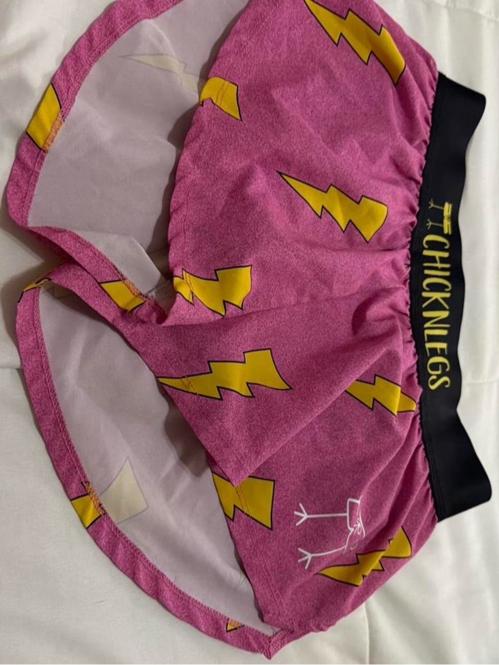 chicken legs Pink Lightning Bolt running shorts